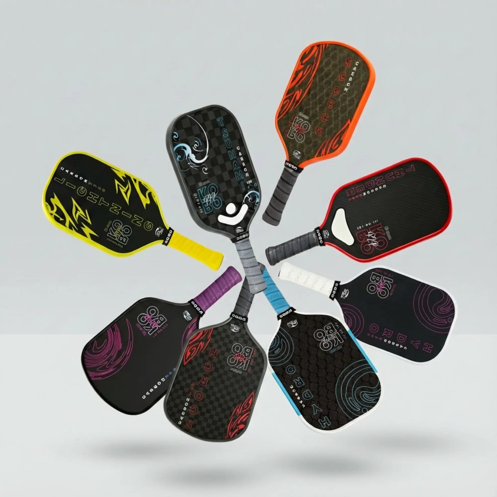 playful, energetic studio image of KOBO Pickleball paddles